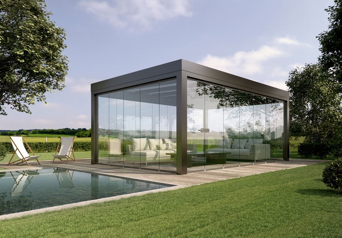 Cierre de terraza de vidrio plegable en posición abierta en La Dehesa